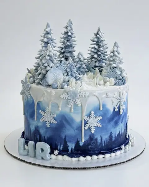 Winter-themed celebration cake, a custom cake by Cakes By Vjollca in Pristina, Kosovo